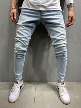Світло блакитні джинси з потертостями D-344