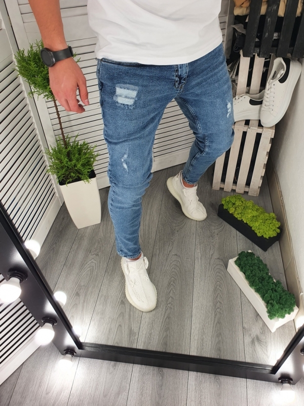 Модные светлые мужские джинсы с дырками D-359