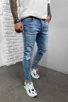 Голубые джинсы с дырками на коленях D-499