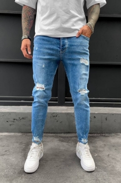 Модные светло синие рваные джинсы с дырками D-527