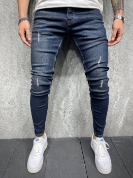 Молодежные темно синие зауженные джинсы D-547