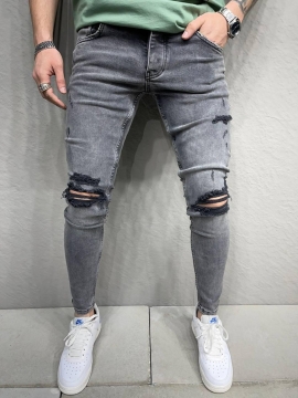 Серые молодежные джинсы с рваными коленями D-619