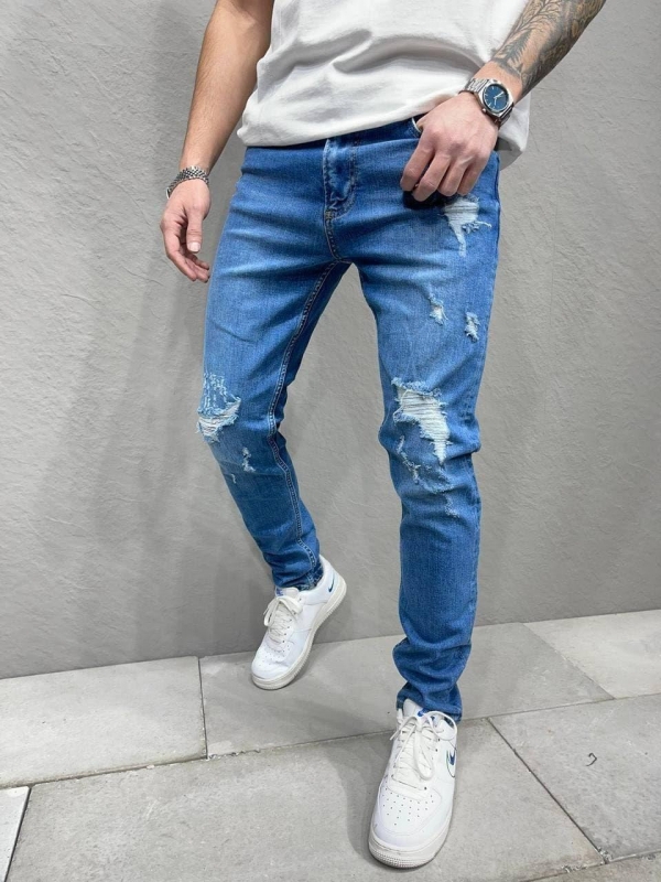 Синие рваные джинсы с дырками D-651